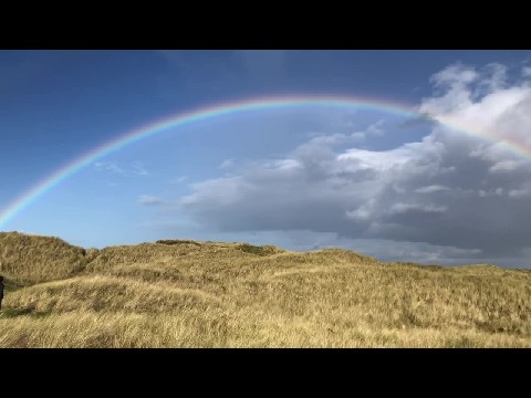 Amazing rainbow over the dunes, Holy Island