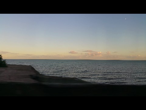 The railway journey between Newton Abbot and Exeter along the coast, from the train window